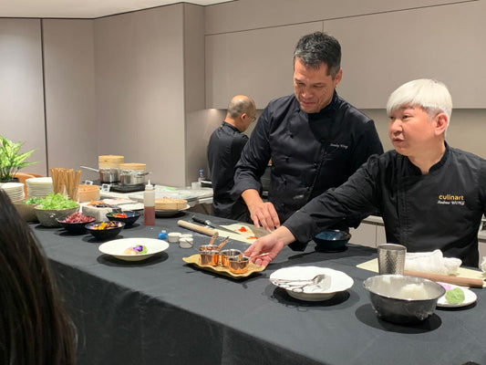 Cooking demonstration for a team building event at a client