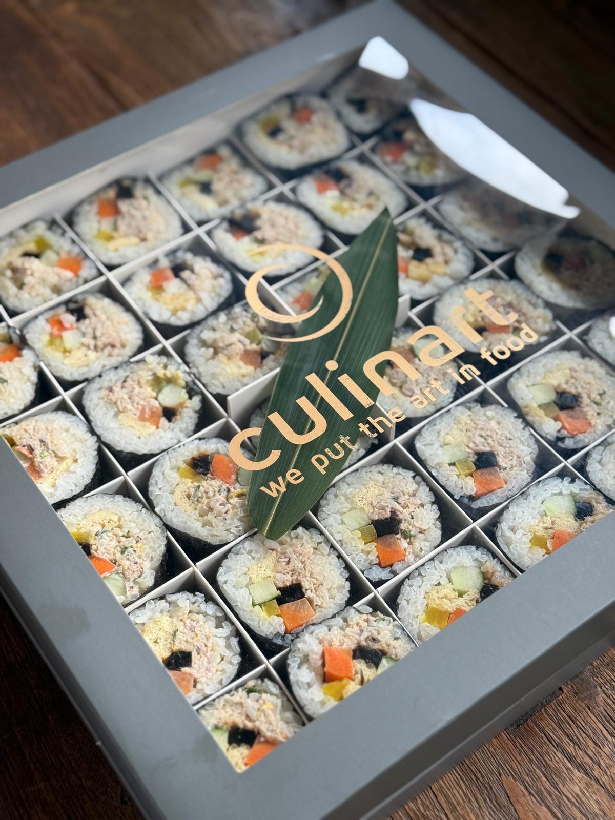 Box of sushi with Culinary Food logo on a wooden surface