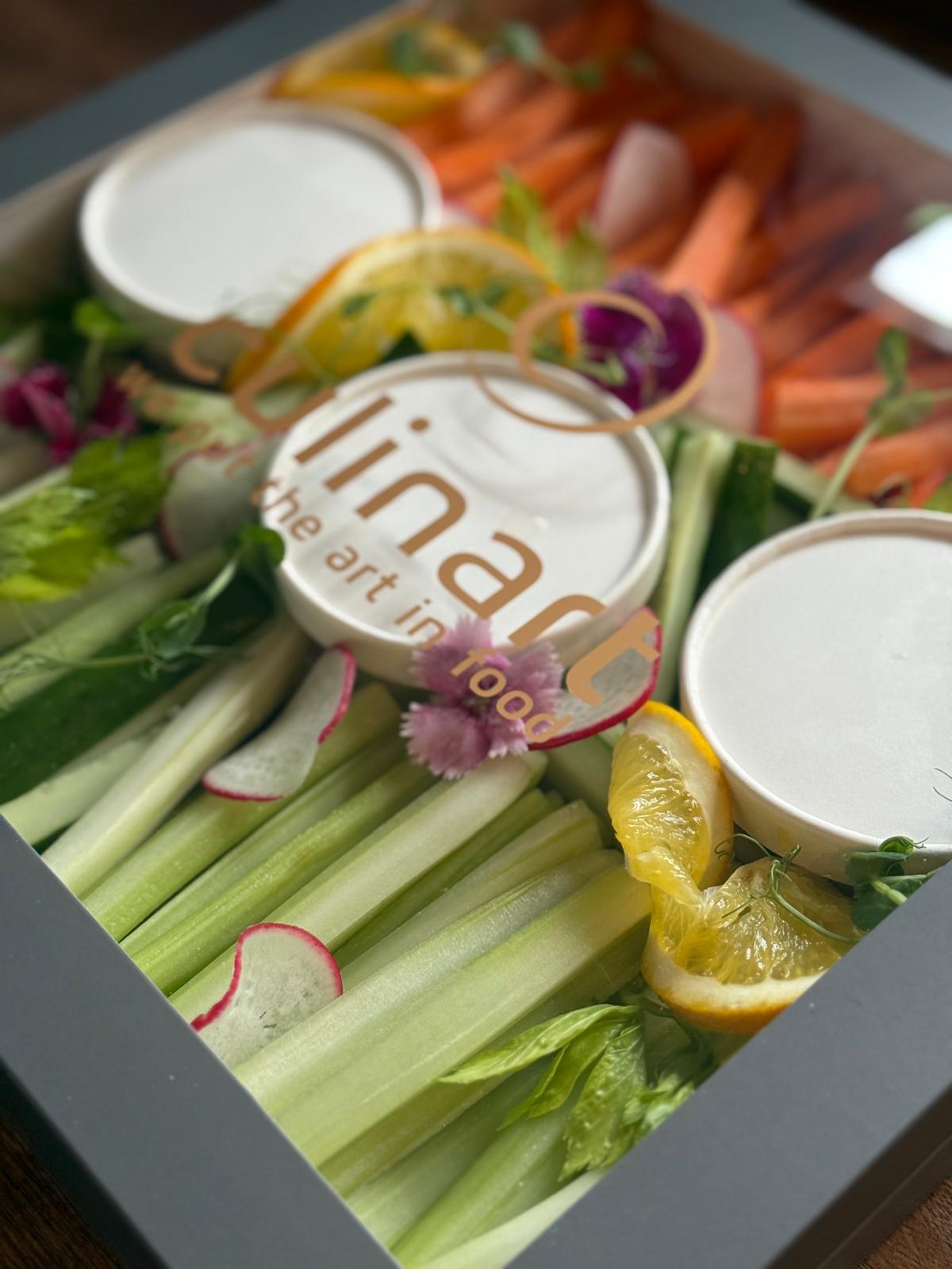 Vegetable crudite platter with dip containers