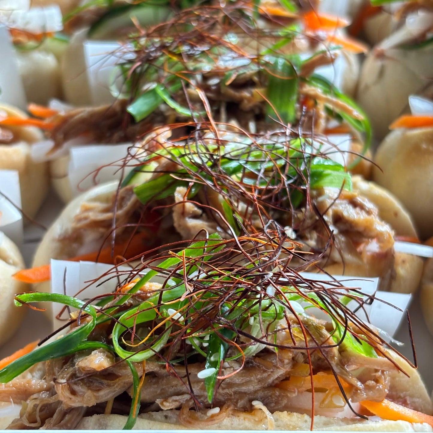 Lemongrass Pork Banh Mi w/ Sriracha & Pickled Daikon (18pc)