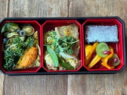 Three-section bento boxes prepared for catering and delivery