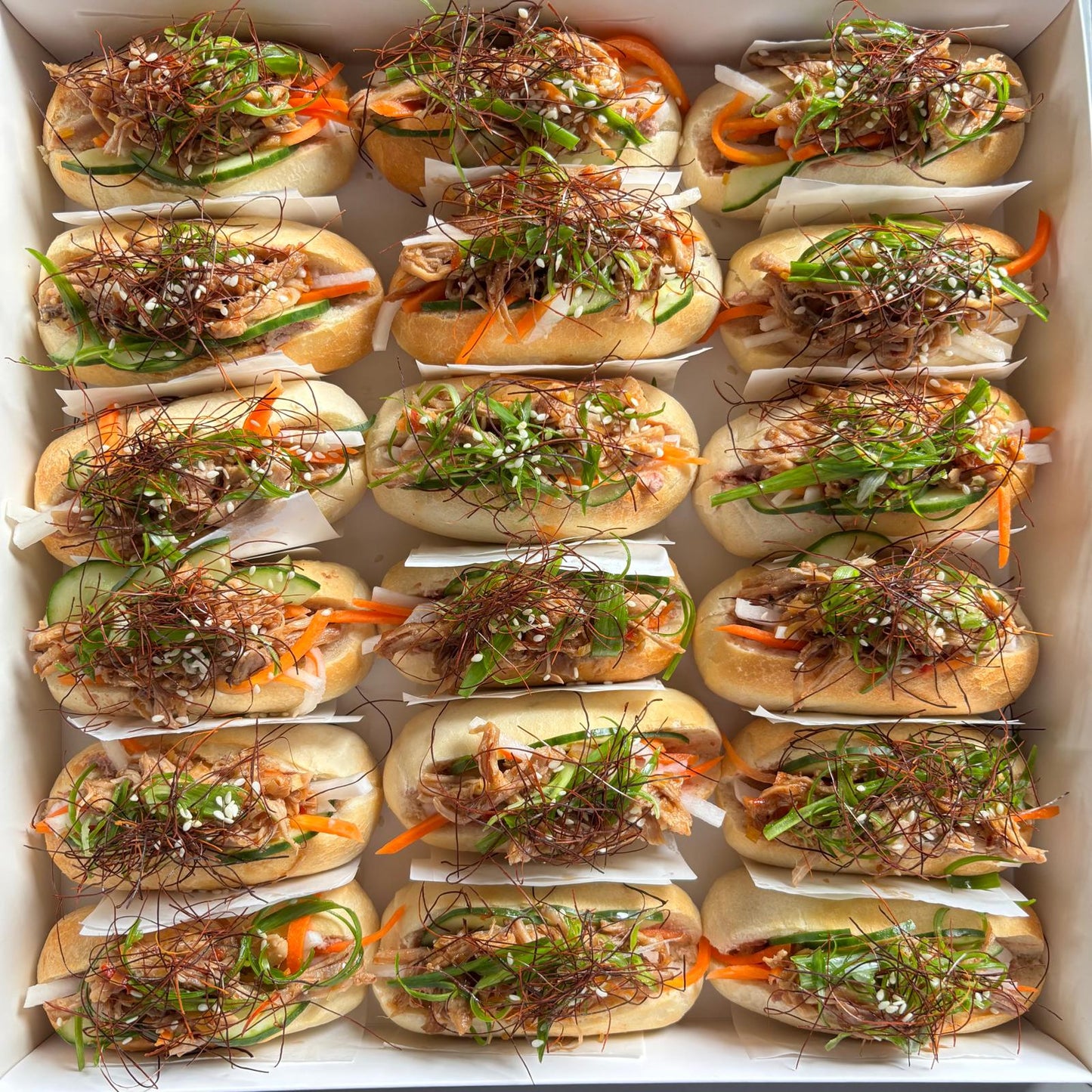 Lemongrass Pork Banh Mi w/ Sriracha & Pickled Daikon (18pc)