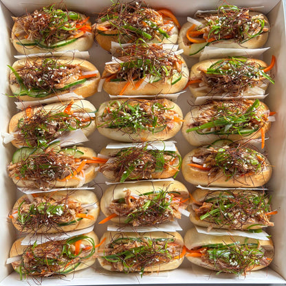 Lemongrass Pork Banh Mi w/ Sriracha & Pickled Daikon (18pc)